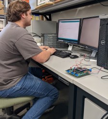 La-ACES_ET_Team_Bryce_Henry_working on coding_the_MegaSat